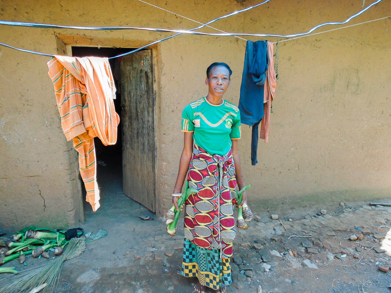 Dorothy, a Burundian coffee farmer, about to plant yams