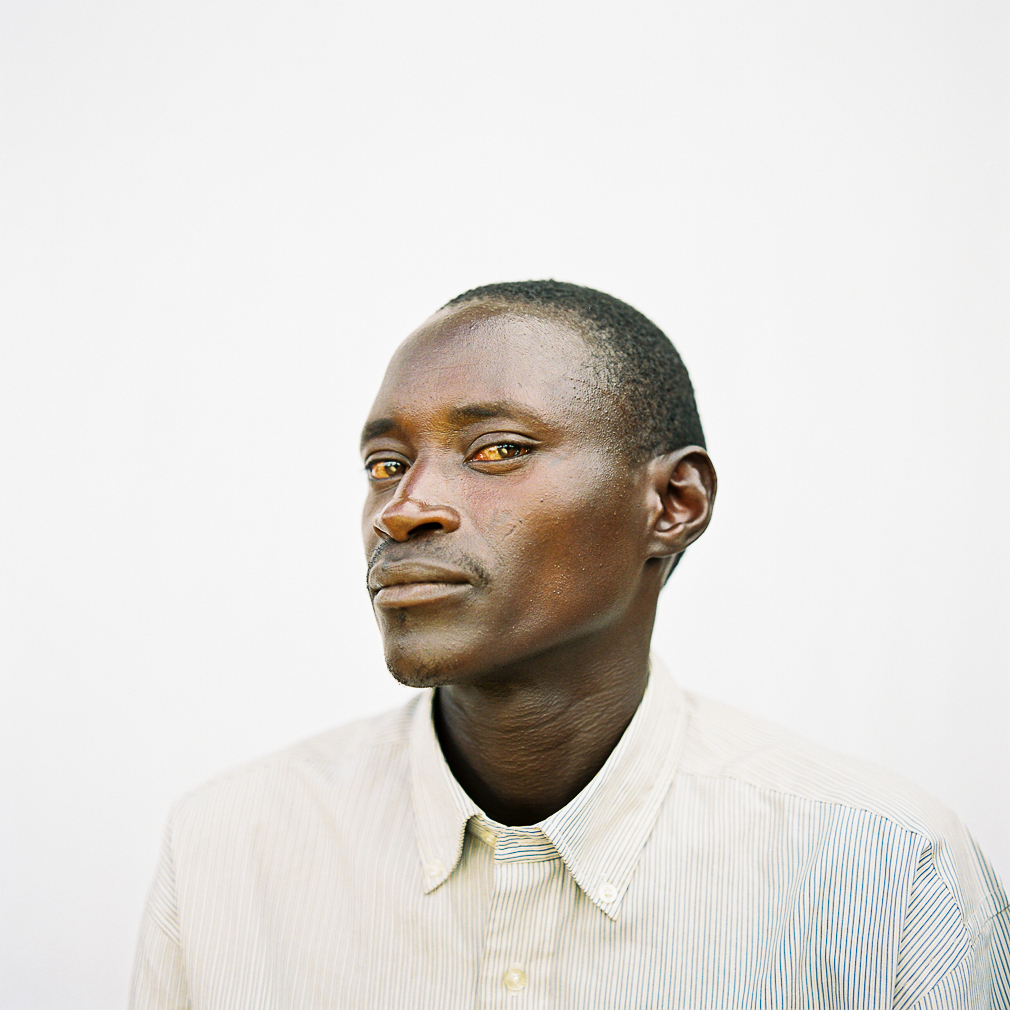 Close-up portrait of a Burundian coffee farmer