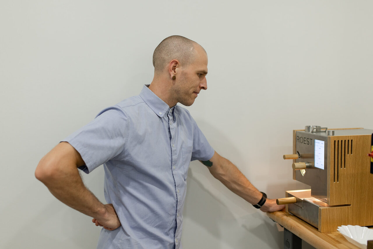 David Stallings using the ROEST Sample Roaster in the Long Miles Coffee Lab