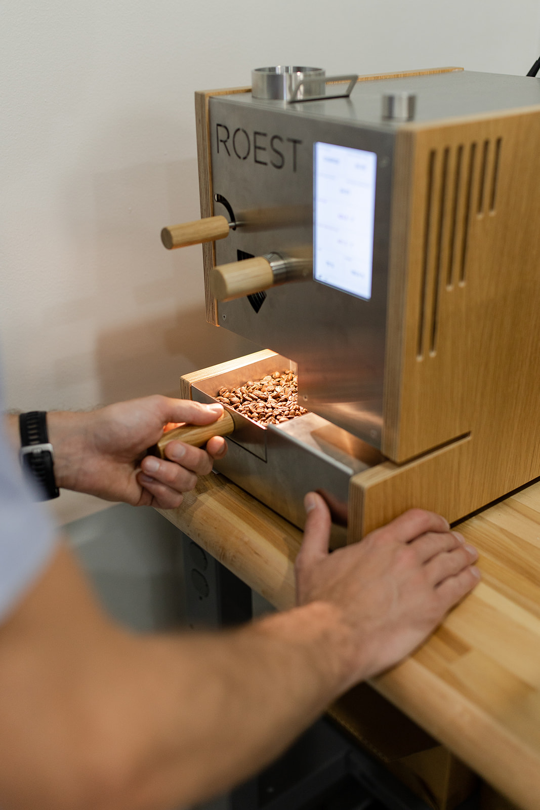 David Stallings using the ROEST Sample Roaster in the Long Miles Coffee Lab